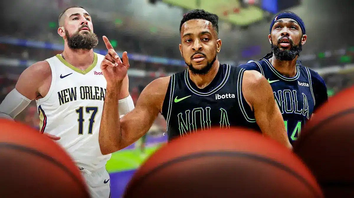 Pelicans CJ McCollum and Brandon Ingram pointing at Jonas Valanciunas
