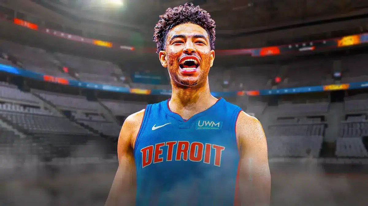Quentin Grimes excited in a Pistons jersey