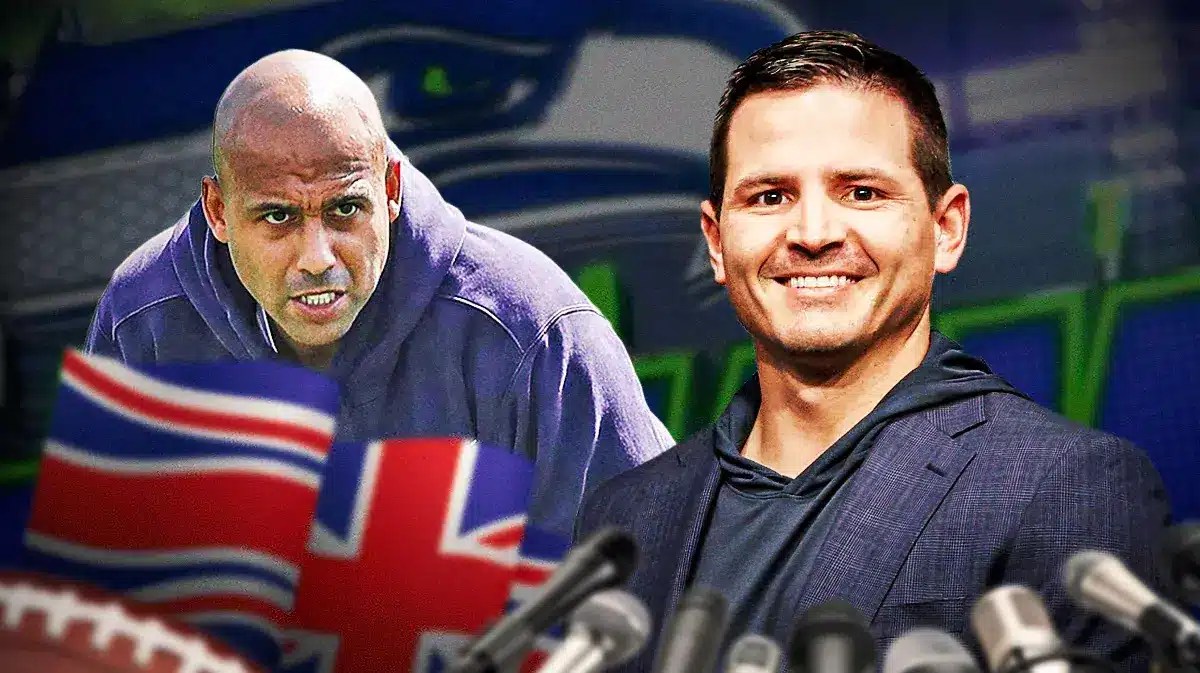 Seahawks head coach Mike Macdonald next to Aden Durde (who is holding a Great Britain flag) with a Seahawks background