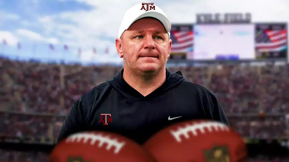 Texas A&M football, Aggies, Mike Elko, Mike Elko Texas A&M, Duke, Mike Elko in Texas A&M gear with Texas A&M football stadium in the background
