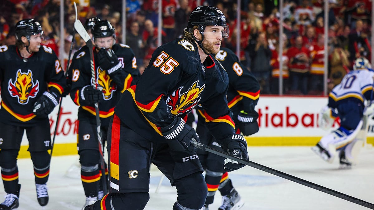 Calgary Flames defenseman Noah Hanifin (55) scores a goal against the St. Louis Blues during the second period at Scotiabank Saddledome.