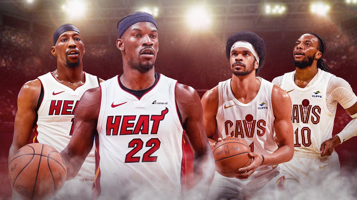 Miami Heat stars Jimmy Butler and Bam Adebayo looking at Cleveland Cavaliers stars Jarrett Allen and Darius Garland in front of the Kaseya Center.