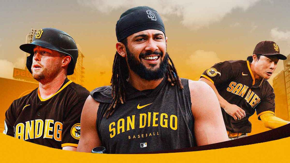 Padres' Fernando Tatis Jr. in front smiling. In background, Padres' Jake Cronenworth looking serious, Padres' Ha-Seong Kim with a baseball glove on fielding a ground ball. Petco Park background.