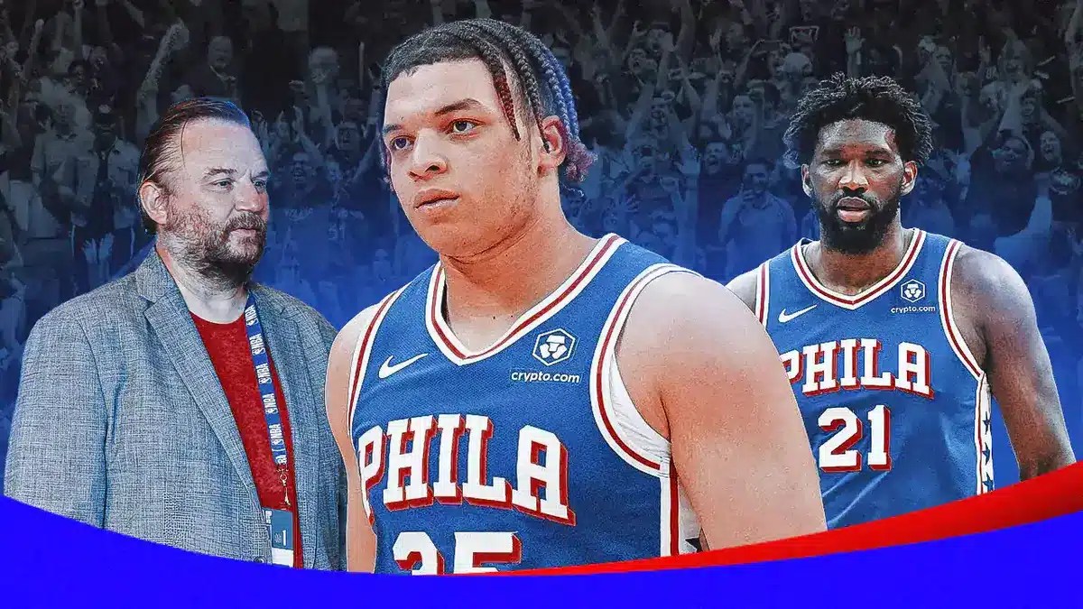 76ers' Joel Embiid and Daryl Morey looking at Kenneth Lofton Jr. (in Sixers uniform)