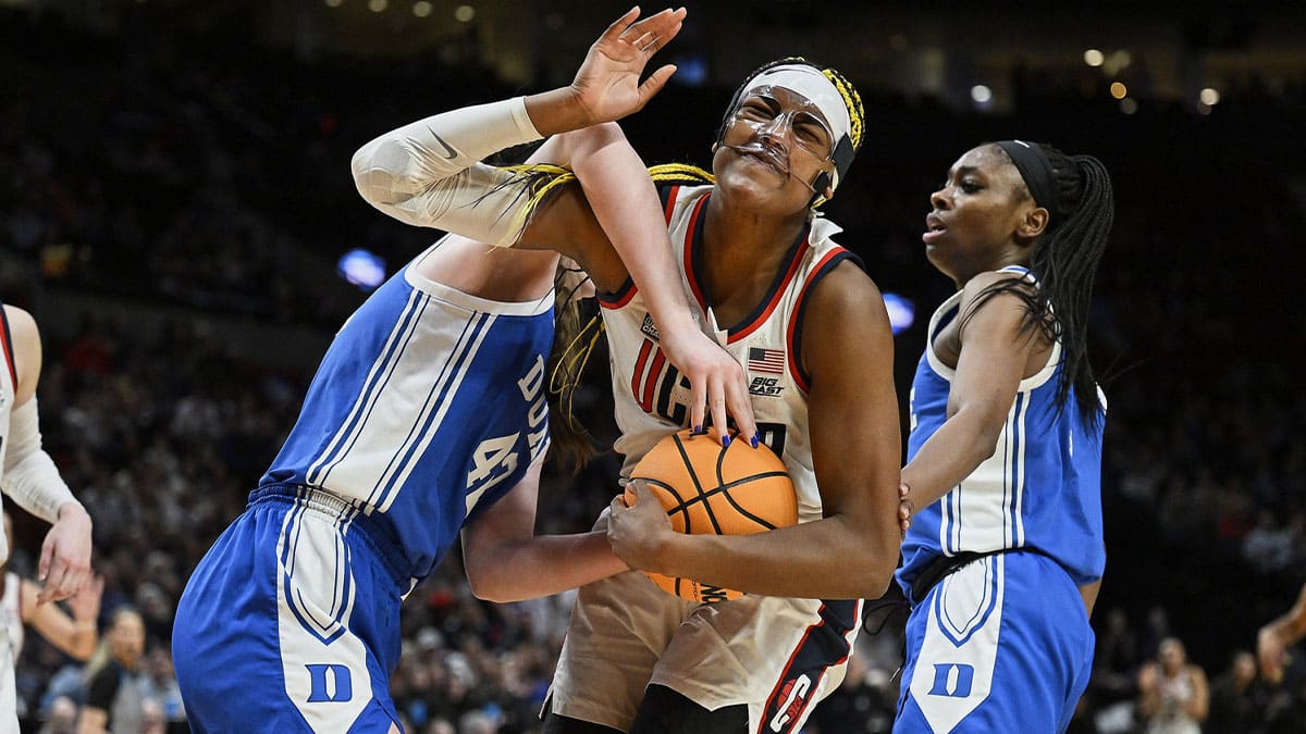 UConn Huskies forward Aaliyah Edwards (3) is fouled by Duke Blue Devils center Kennedy Brown (42) during the second half in the semifinals of the Portland Regional of the 2024 NCAA Tournament at the Moda Center.