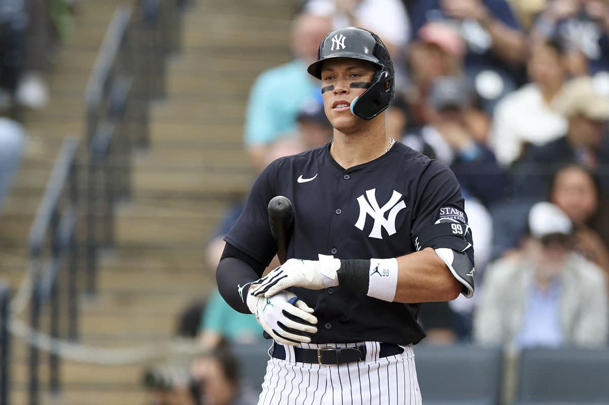 Aaron Judge adjusting his gloves on the New York Yankees