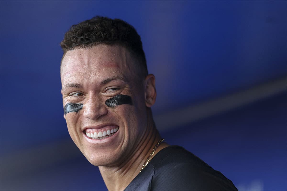 New York Yankees center fielder Aaron Judge (99) looks on from the dugout against the Toronto Blue Jays in the fifth inning at TD Ballpark.