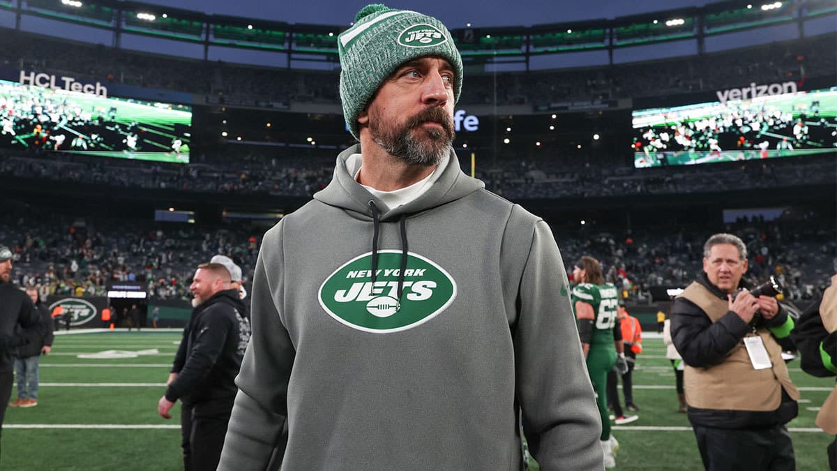 New York Jets quarterback Aaron Rodgers (8) on the field after the game against the Washington Commanders at MetLife Stadium.