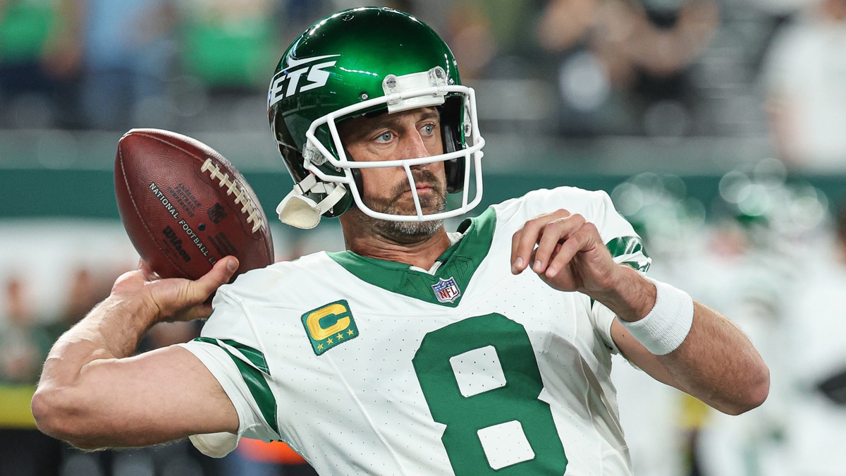 New York Jets quarterback Aaron Rodgers (8) warms up before the game against the Buffalo Bills at MetLife Stadium