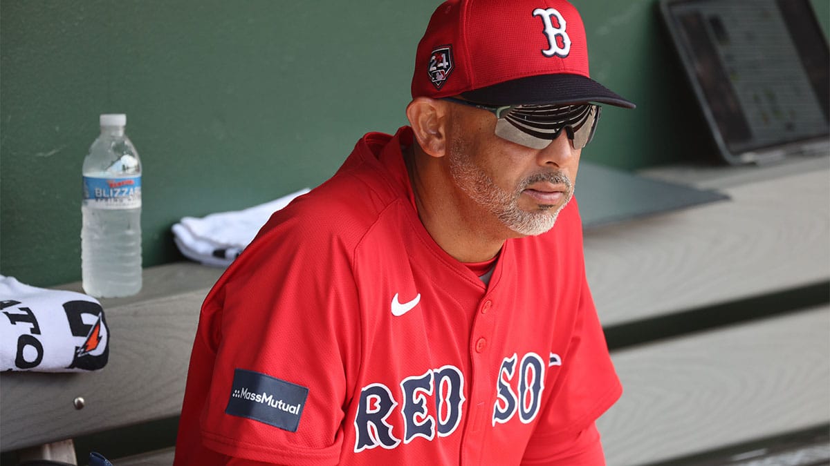 Boston Red Sox manager Alex Cora (13) looks on against the Baltimore Orioles at Ed Smith Stadium. 