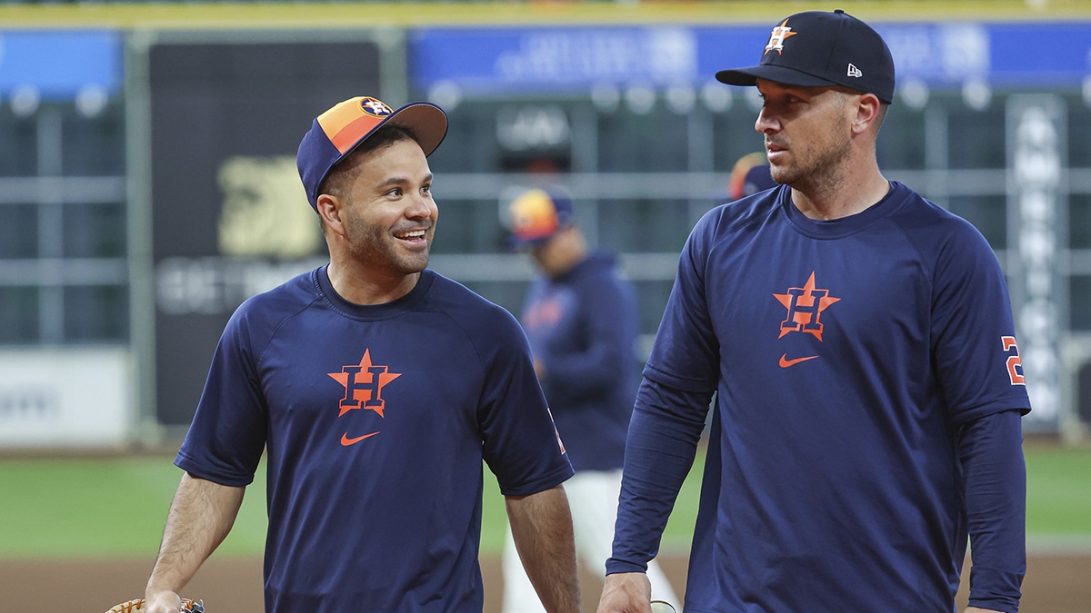 Houston Astros second baseman Jose Altuve (27) talks with third baseman Alex Bregman (2) before the game against the New York Yankees at Minute Maid Park.