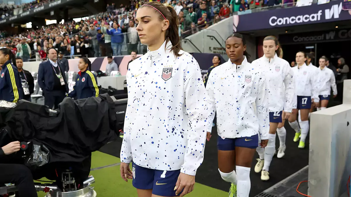 United States forward Alex Morgan (7, left) enters the field prior to the Concacaf W Gold Cup quaterfinal game between against Columbia at BMO Stadium.