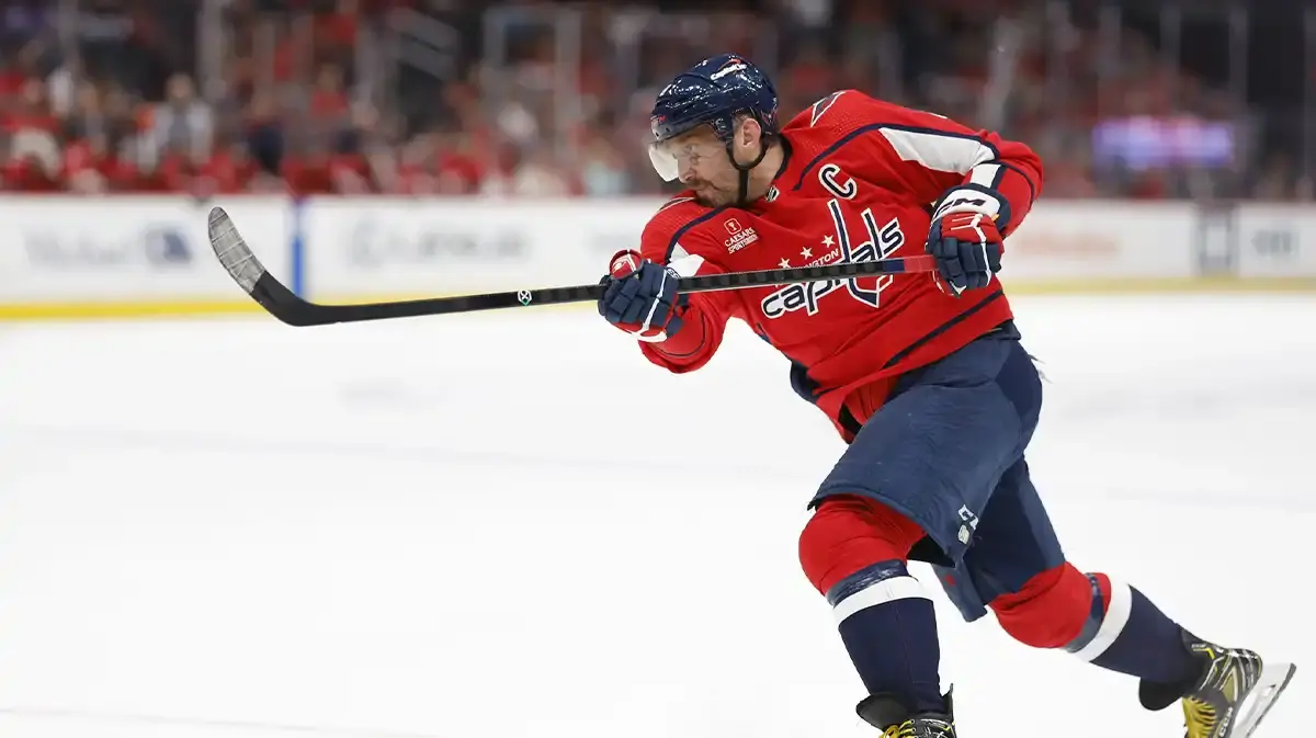 Washington Capitals left wing Alex Ovechkin (8) shoots the puck against the Arizona Coyotes in the third period at Capital One Arena