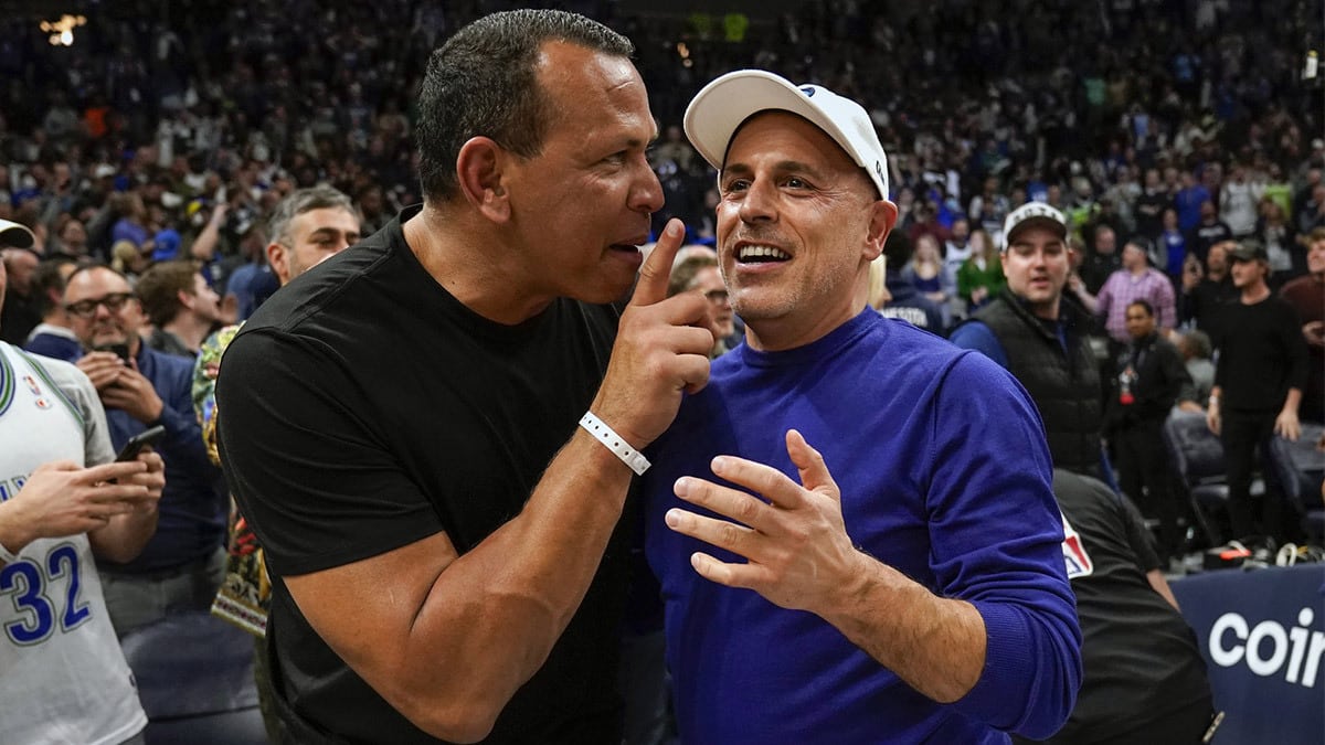  Minnesota Timberwolves co-minority owners Alex Rodriguez and Marc Lore celebrate a victory over the Los Angeles Clippers after a play-in game at Target Center. 
