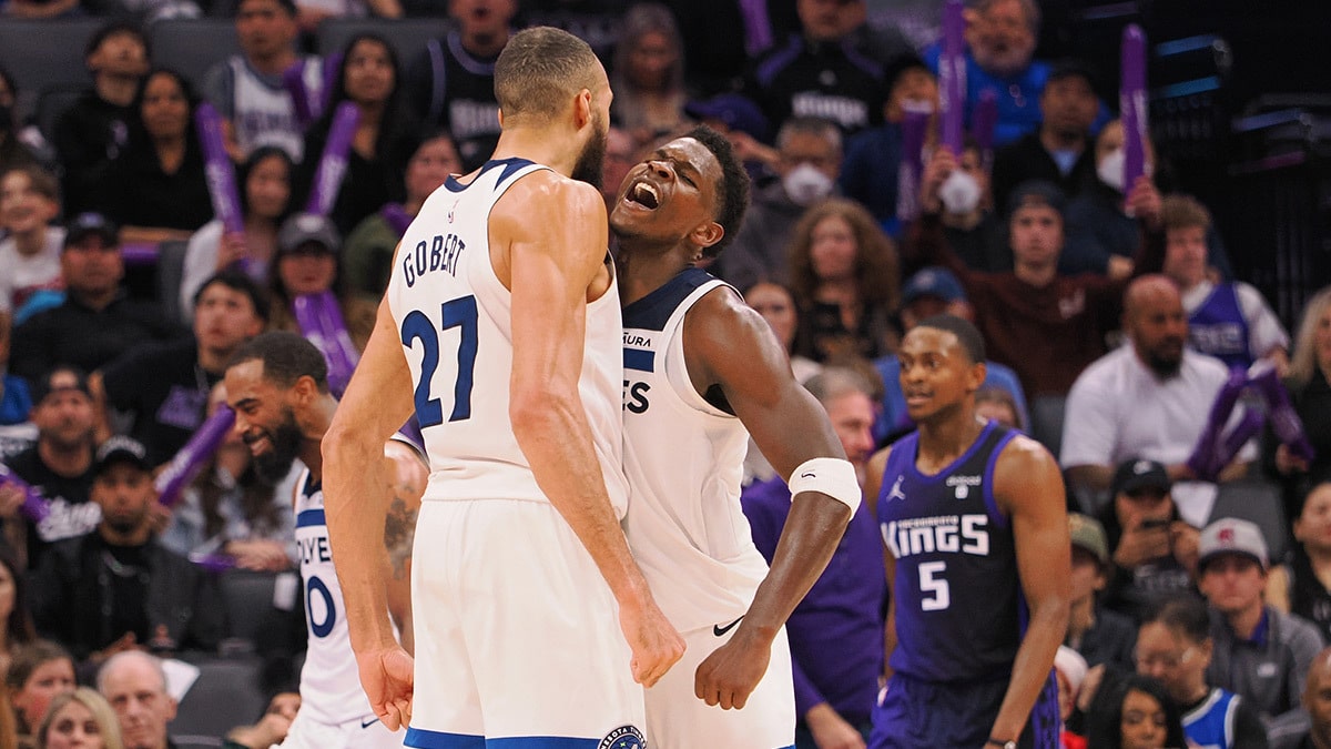 Minnesota Timberwolves guard Anthony Edwards (5) celebrates with center Rudy Gobert (27) after a basket against the Sacramento Kings during the fourth quarter at Golden 1 Center.