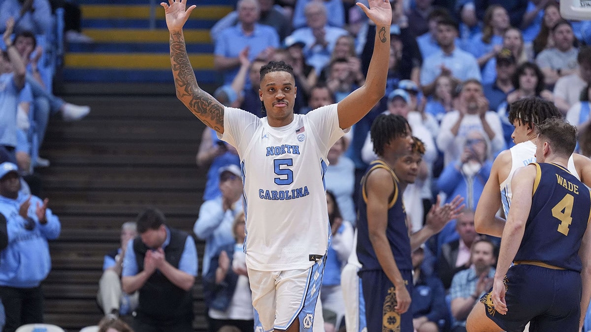 North Carolina Tar Heels forward Armando Bacot (5) acknowledges the crowd on senior night during the second half against the Notre Dame Fighting Irish at Dean E. Smith Center.