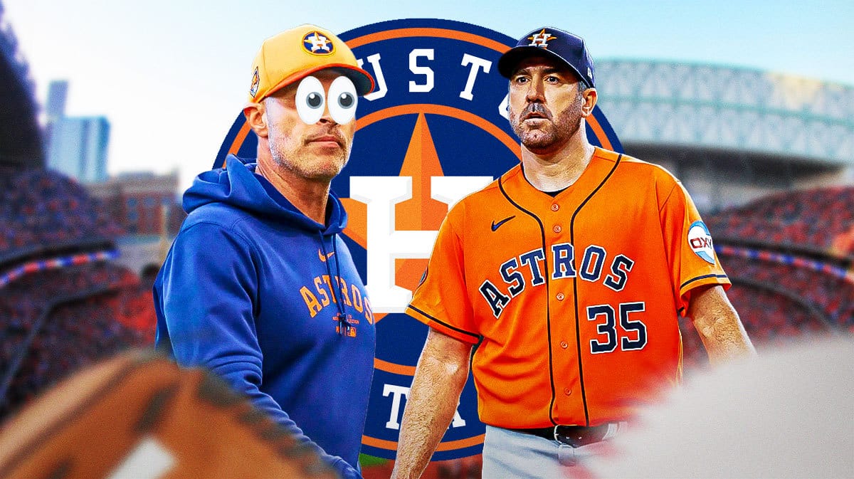 Joe Espada with emoji eyes in his eyes looking at Justin Verlander in front of an Astros logo at Minute Maid Park