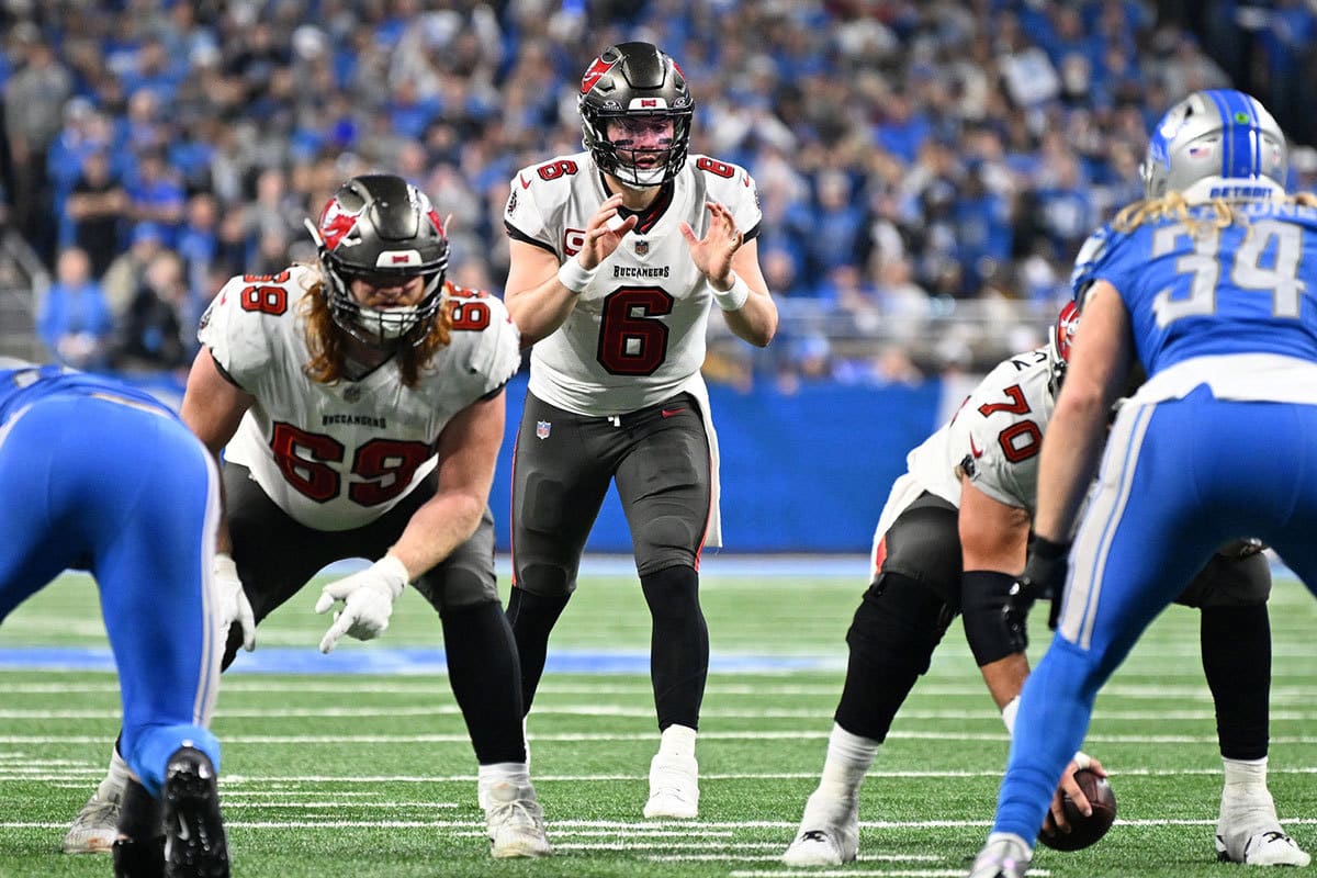 Tampa Bay Buccaneers quarterback Baker Mayfield (6) prepares for a snap against the Detroit Lions during the second half in a 2024 NFC divisional round game at Ford Field.