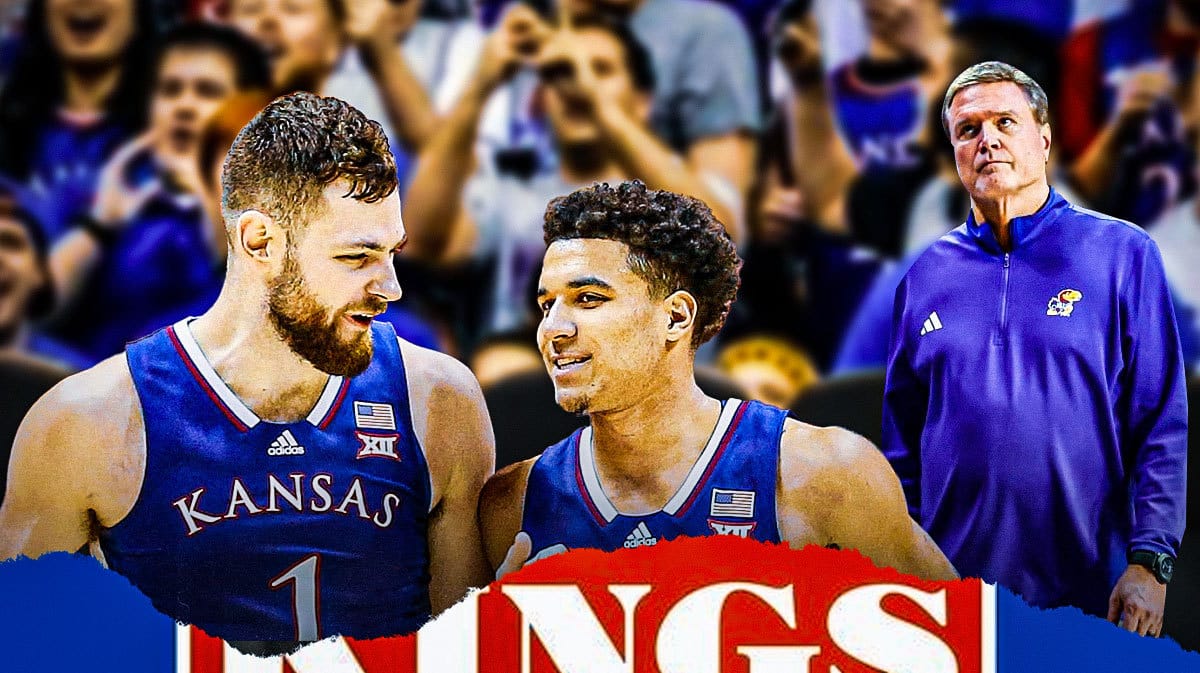 Kansas’ Hunter Dickinson, Kevin McCullar Jr. sitting on the bench. Bill Self looks dejected