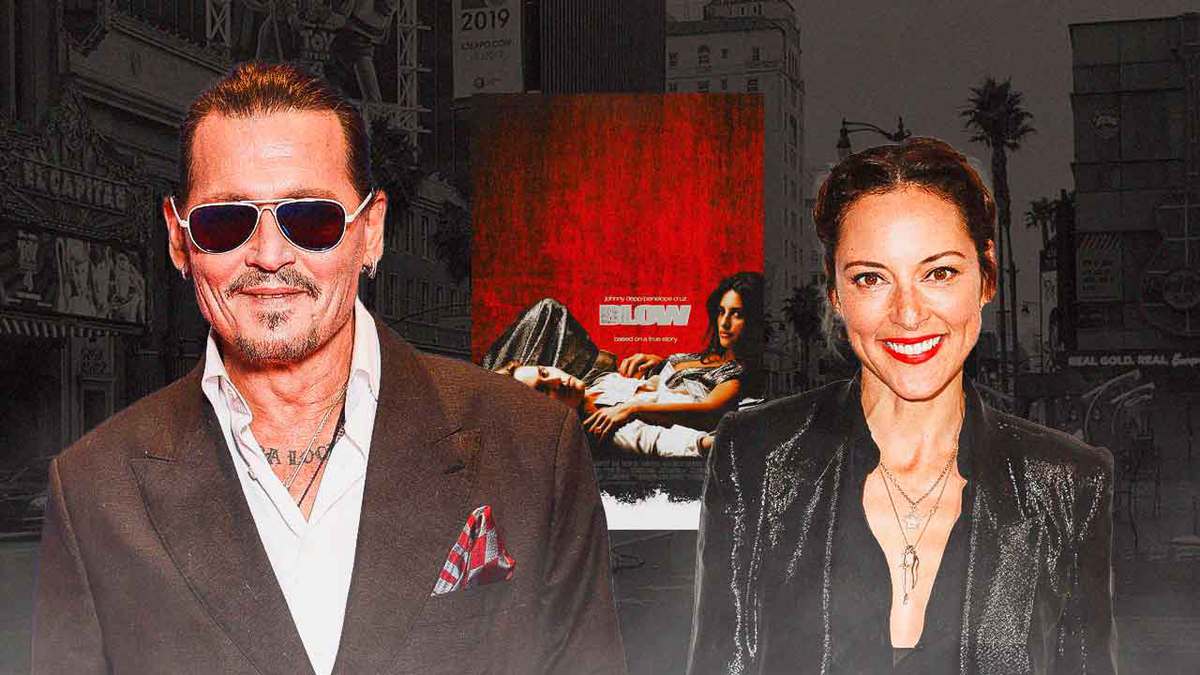 Johnny Depp and Lola Glaudini with a Blow poster.
