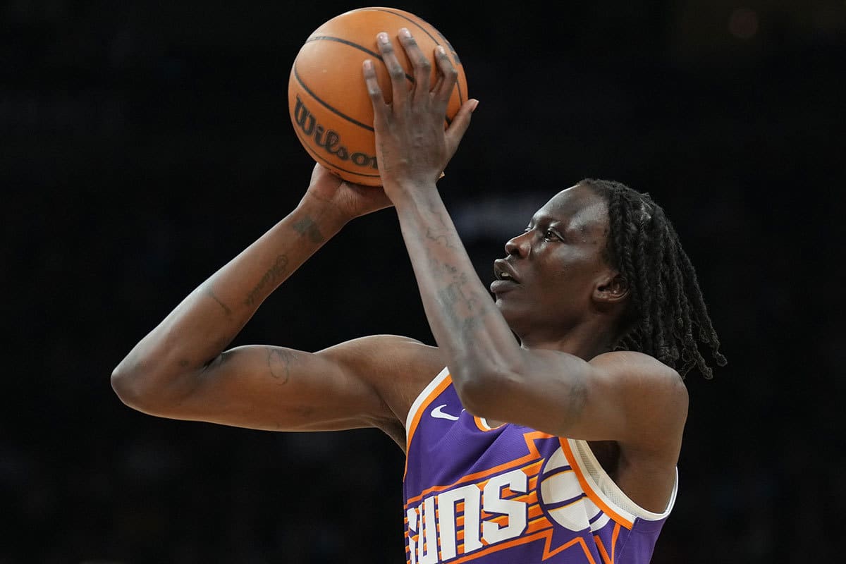 Phoenix Suns center Bol Bol (11) shoots against the Toronto Raptors during the second half at Footprint Center.