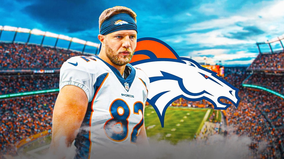 Ex-Saints TE Adam Trautman stands next to Broncos logo, Drew Brees, Russell Wilson stand out of sight while free agency reporters talk