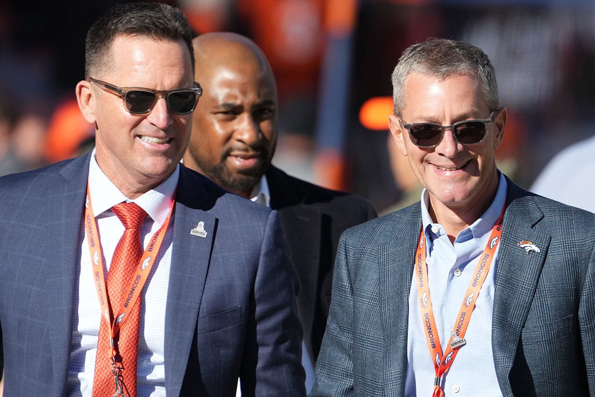 Denver Broncos CEO Greg Penner (right) and general manager George Paton (left) before the game against the Las Vegas Raiders at Empower Field at Mile High. 