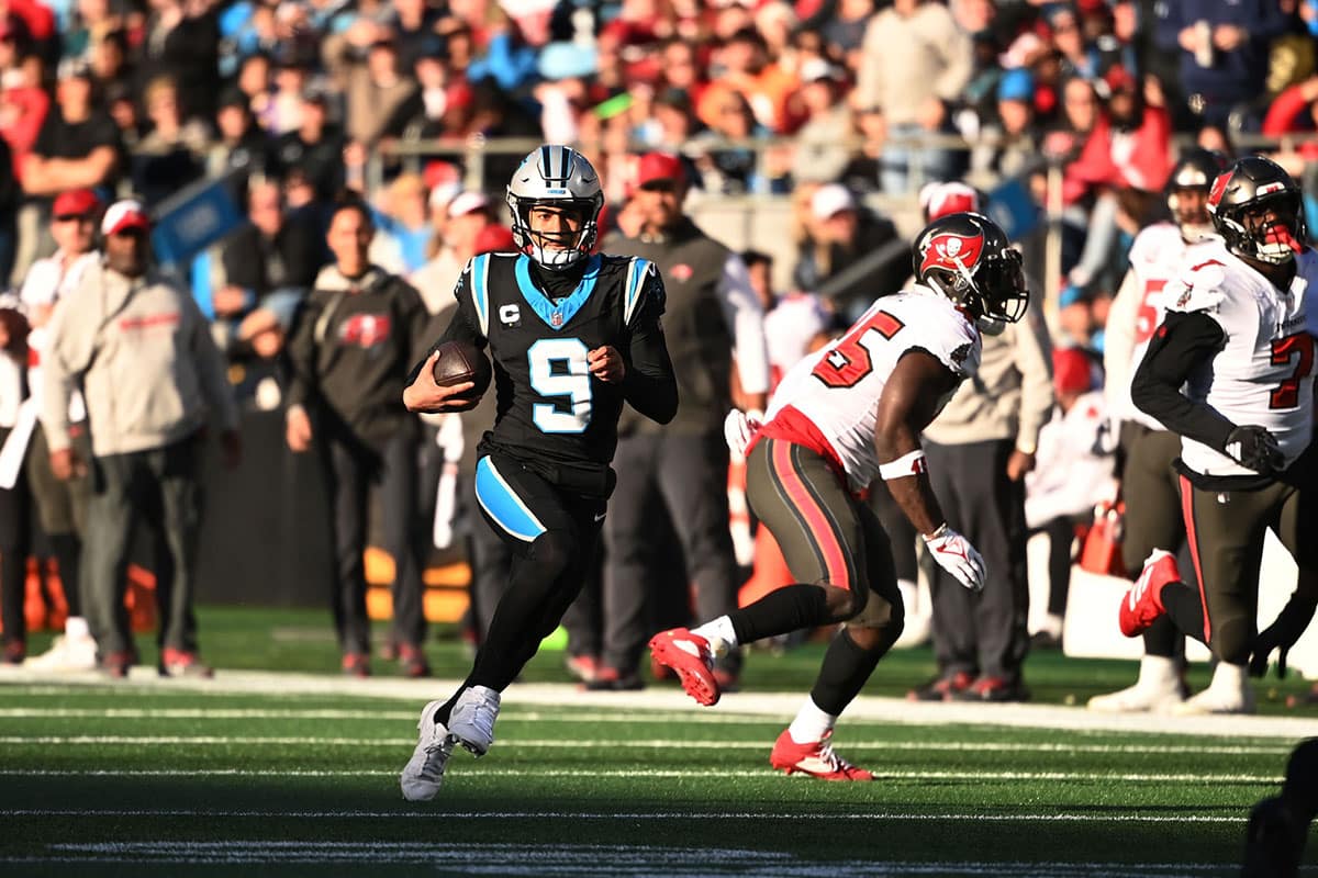 Carolina Panthers quarterback Bryce Young (9) scrambles in the fourth quarter at Bank of America Stadium.