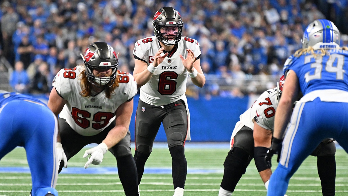 Tampa Bay Buccaneers quarterback Baker Mayfield (6) prepares for a snap against the Detroit Lions during the second half in a 2024 NFC divisional round game at Ford Field.