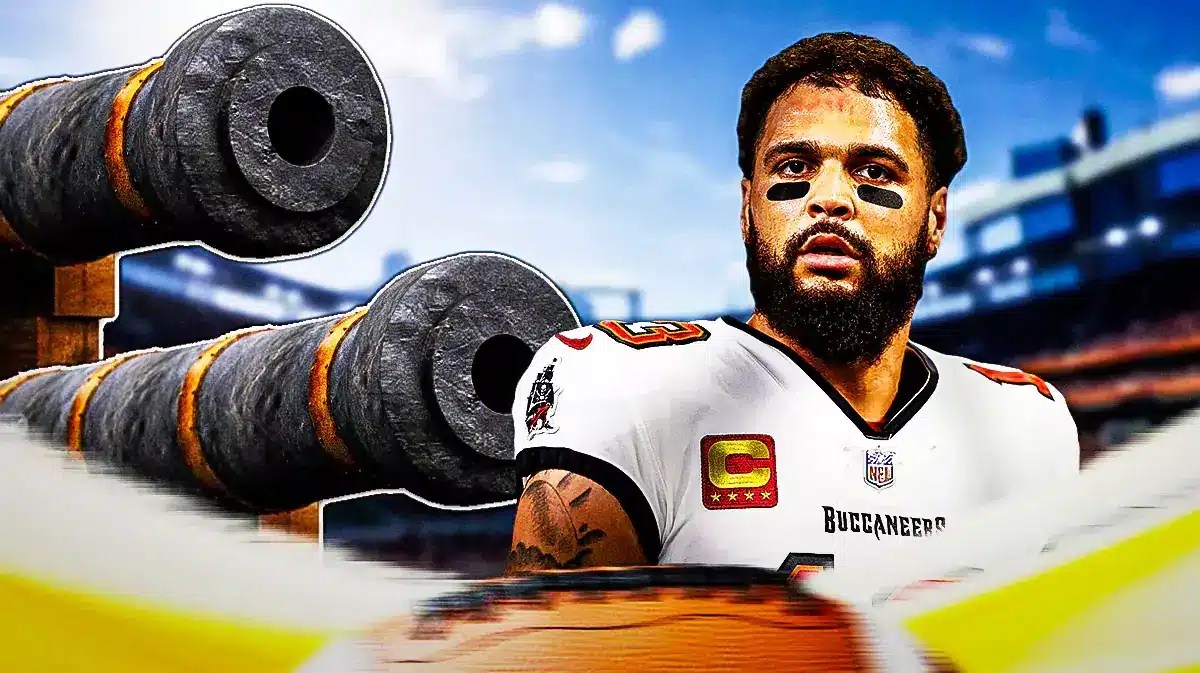 Buccaneers' Mike Evans hyped up with two cannons beside him
