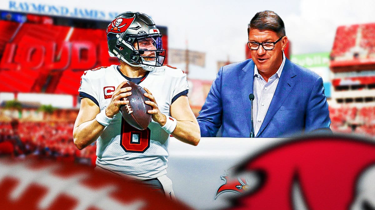 Tampa Bay Buccaneers star Baker Mayfield and general manager Jason Licht in front of Raymond James Stadium.