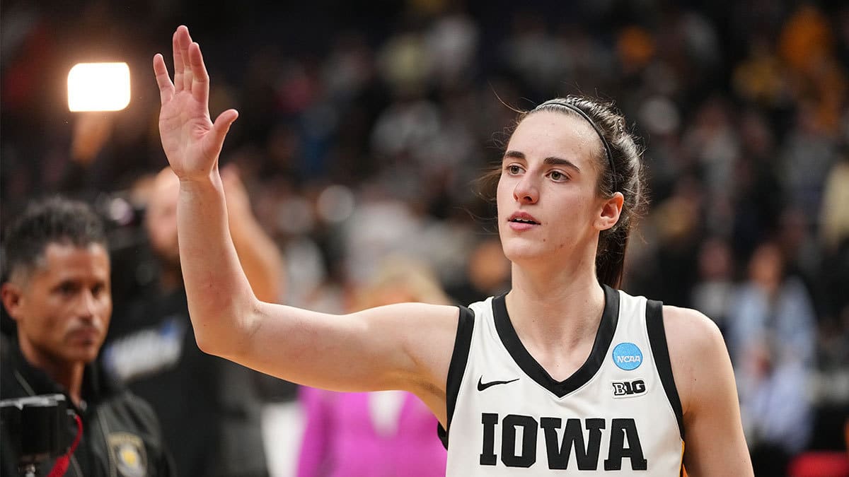 Iowa Hawkeyes guard Caitlin Clark (22) waves to the crowd after the Sweet 16 round of the NCAA Women's Basketball Tournament at MVP Arena,