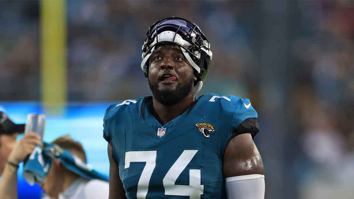 Cam Robinson (74) reacts to a catch being confirmed in favor of the Jacksonville Jaguars during the second quarter of a preseason matchup Saturday, Aug. 26, 2023 at EverBank Stadium