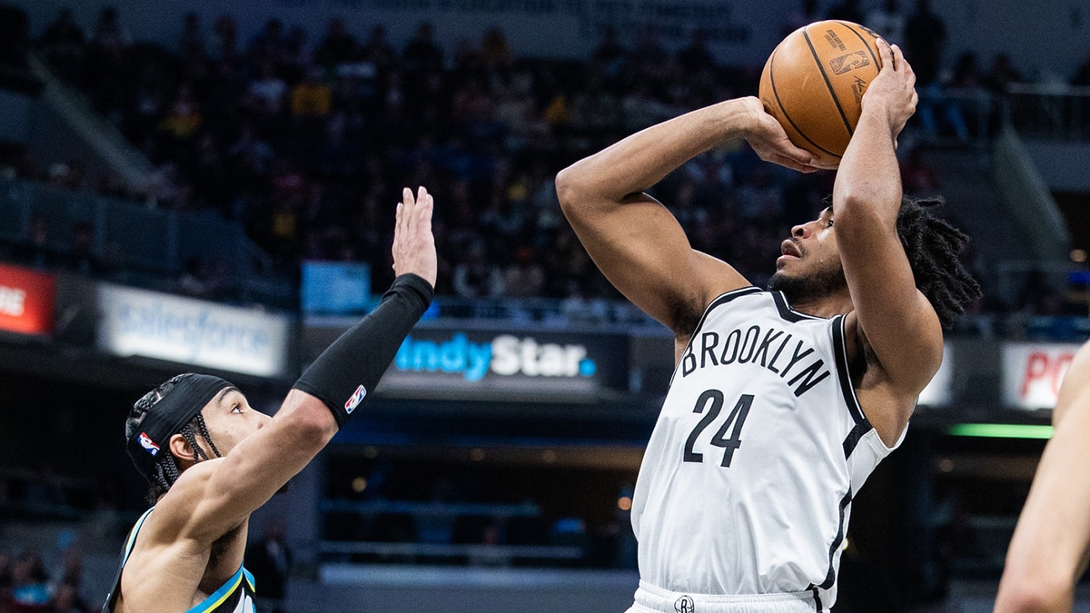Brooklyn Nets guard Cam Thomas (24) shoots the ball while Indiana Pacers guard Andrew Nembhard (2) defends in the second half at Gainbridge Fieldhouse.