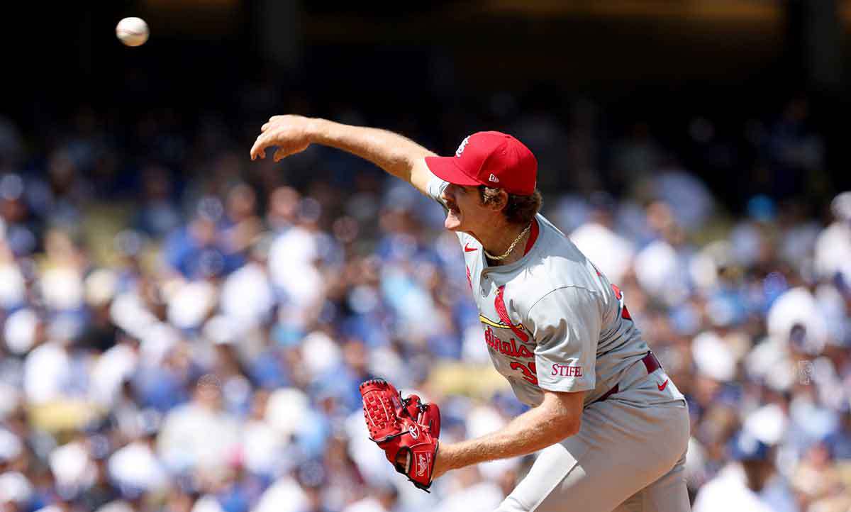 St. Louis Cardinals pitcher Miles Mikolas (39) throws during the first inning of an opening day game against the Los Angeles Dodgers at Dodger Stadium.