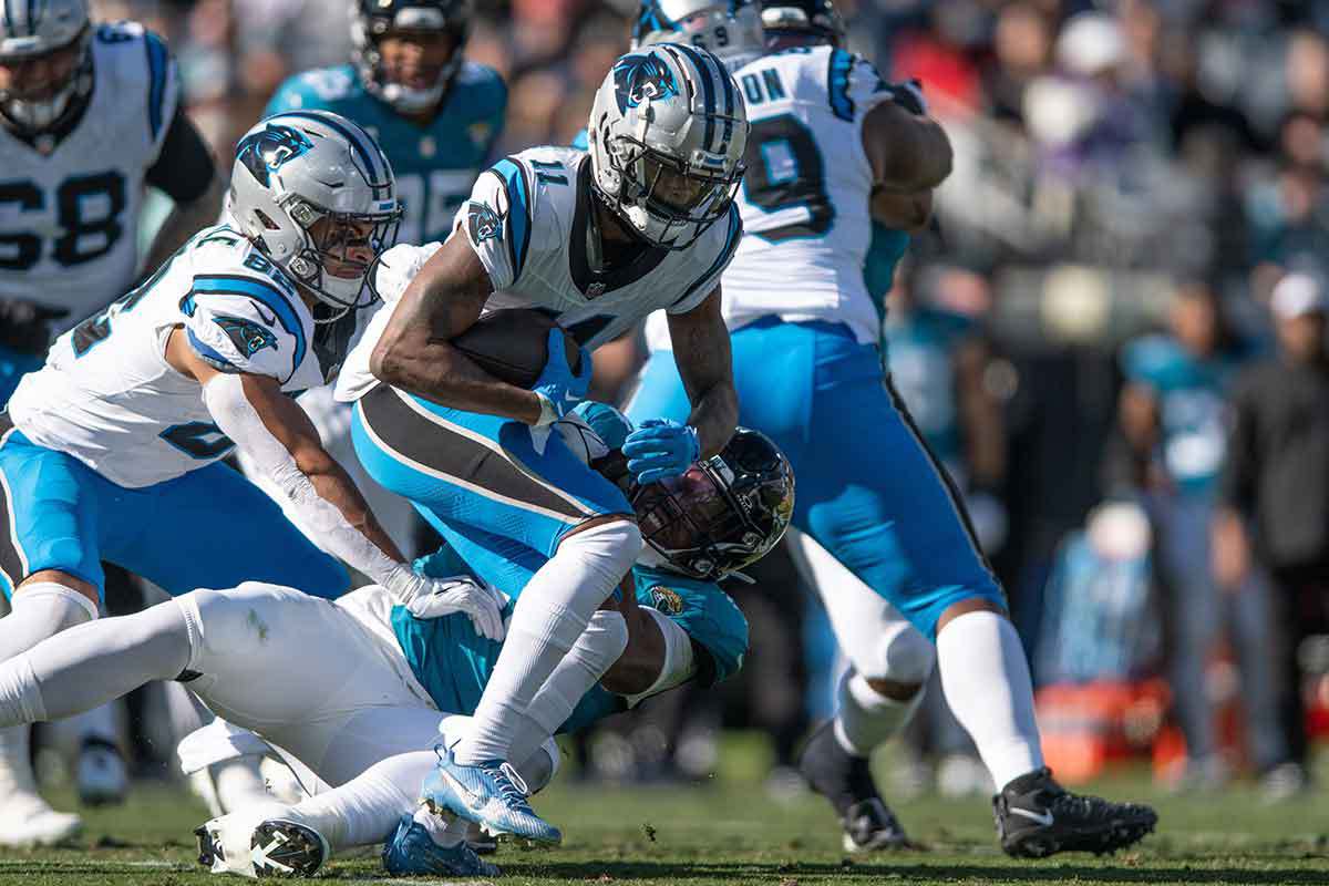 ; Carolina Panthers wide receiver Ihmir Smith-Marsette (11) runs the ball against the Jacksonville Jaguars in the second quarter at EverBank Stadium