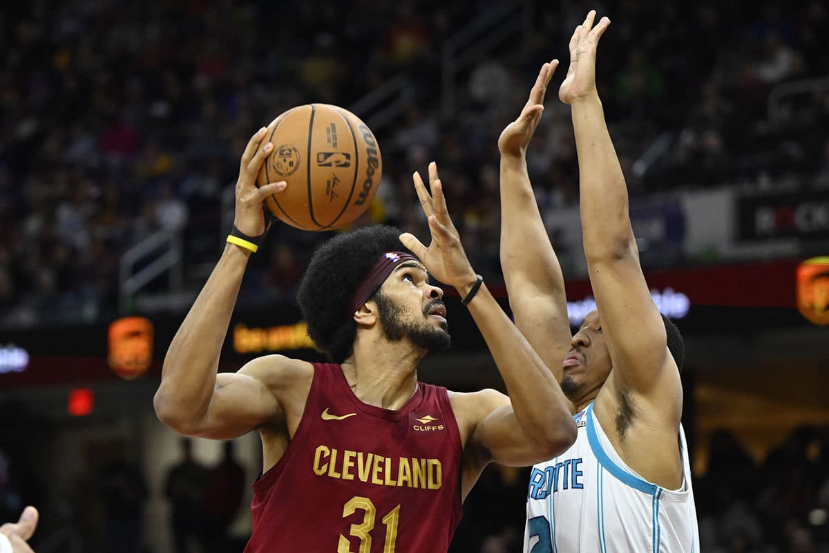 Cleveland Cavaliers center Jarrett Allen (31) shoots beside Charlotte Hornets forward Grant Williams (2) in the second quarter at Rocket Mortgage FieldHouse. 