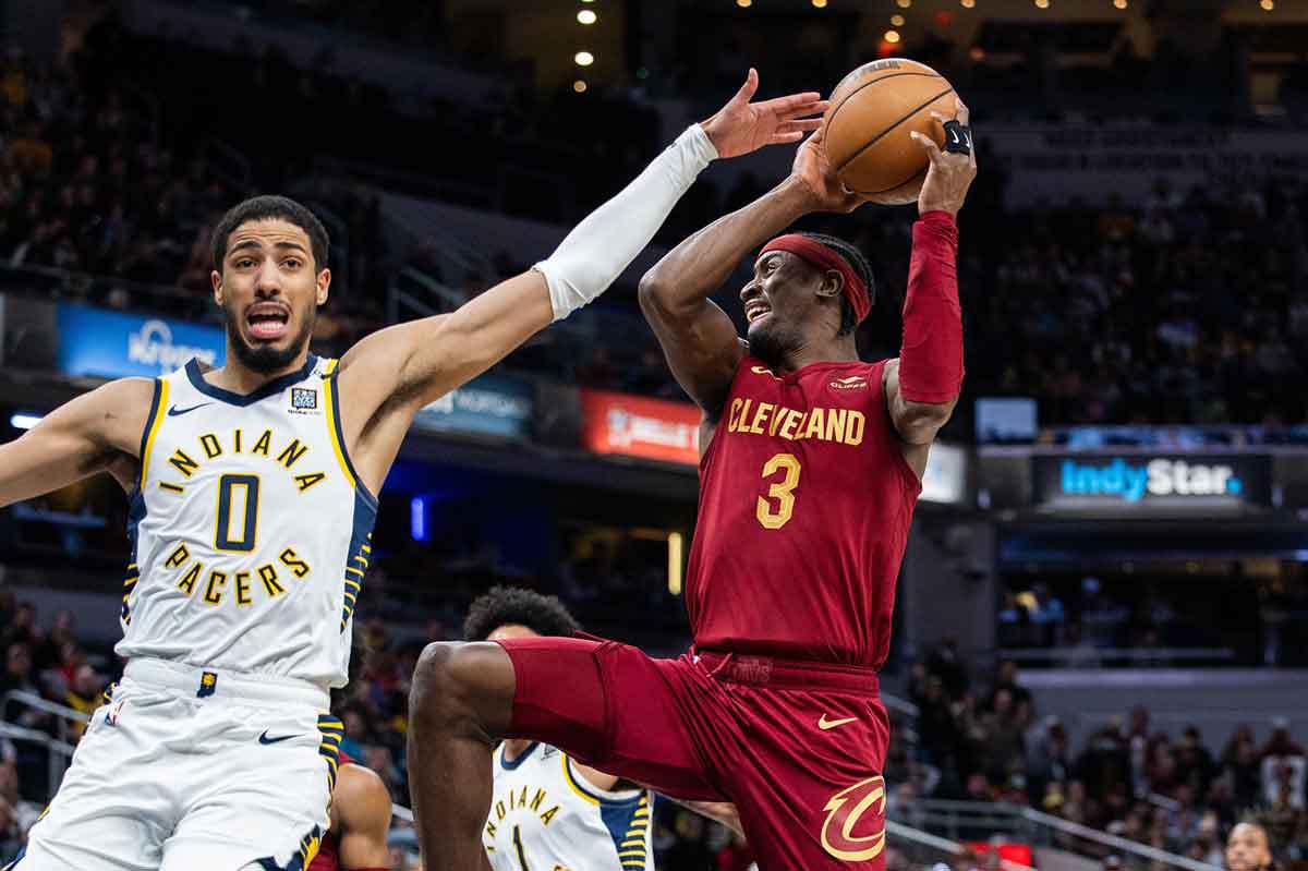 Cleveland Cavaliers guard Caris LeVert (3) shoots the ball while Indiana Pacers guard Tyrese Haliburton (0) defends