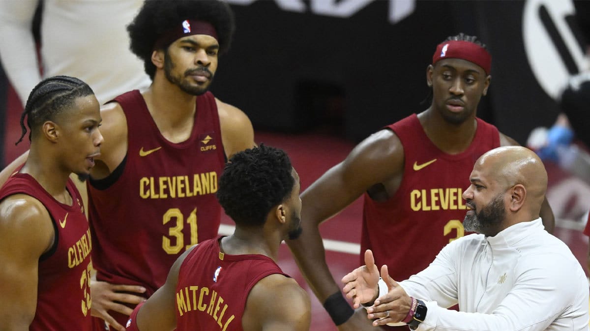 Cleveland Cavaliers head coach J. B. Bickerstaff talks to his team during a timeout in the fourth quarter against the Detroit Pistons at Rocket Mortgage FieldHouse. 