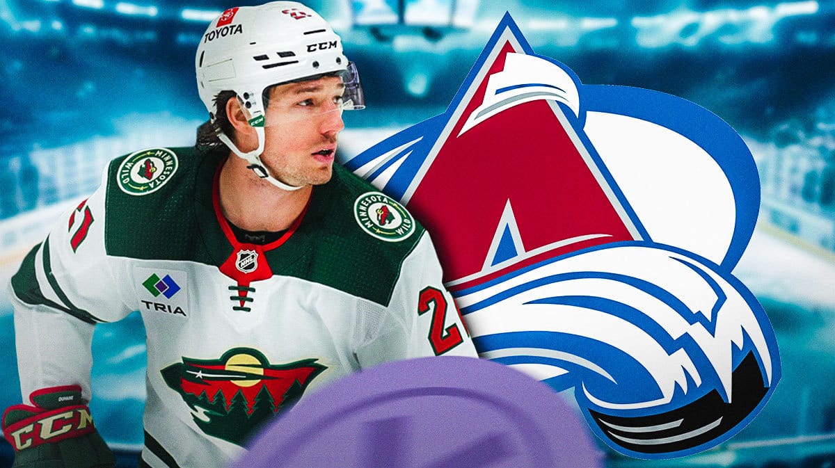 Brandon Duhaime, Colorado Avalanche logo, hockey rink in background.