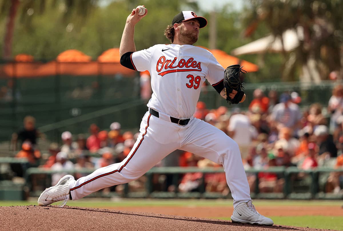 Baltimore Orioles starting pitcher Corbin Burnes (39) throws a pitch during the first inning against the Boston Red Sox at Ed Smith Stadium