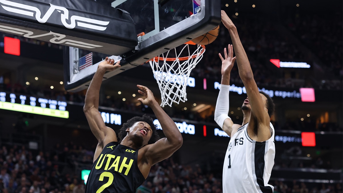Utah Jazz guard Collin Sexton (2) has a shot blocked by San Antonio Spurs center Victor Wembanyama (1) during the second quarter at Delta Center.