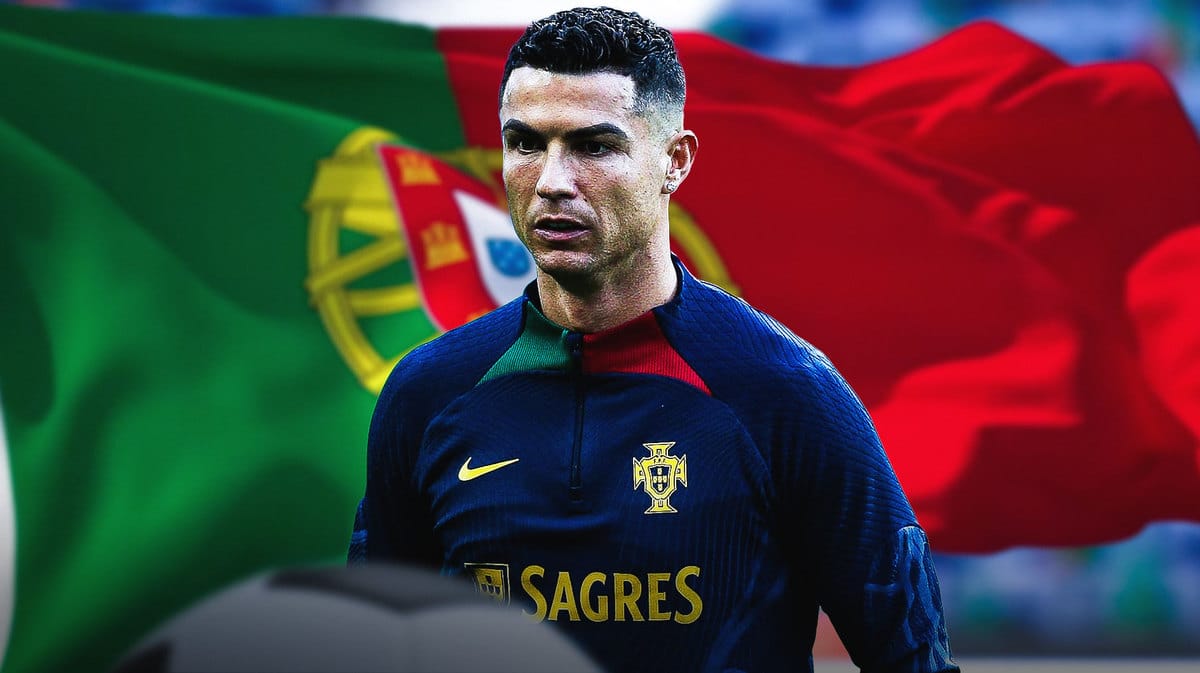 Cristiano Ronaldo training in front of the Portugese flag