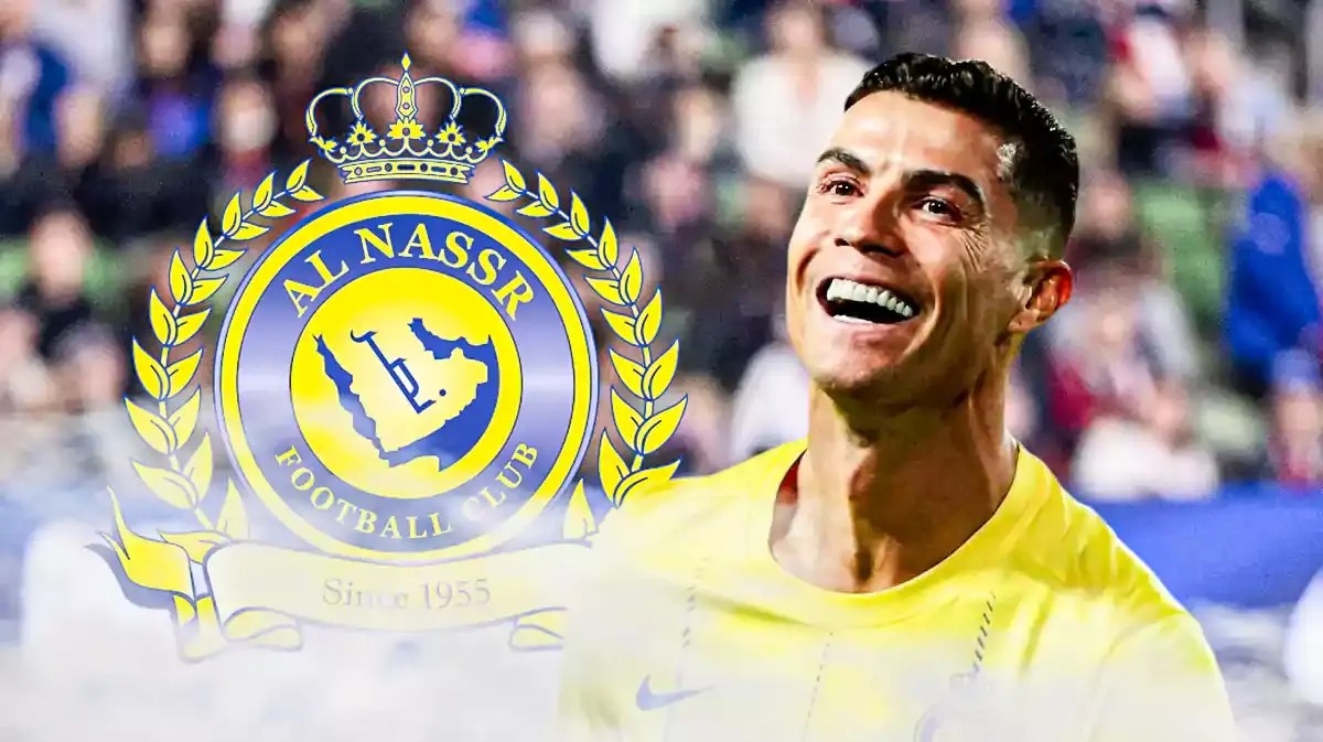 Cristiano Ronaldo smiling in front of the Al-Nassr logo