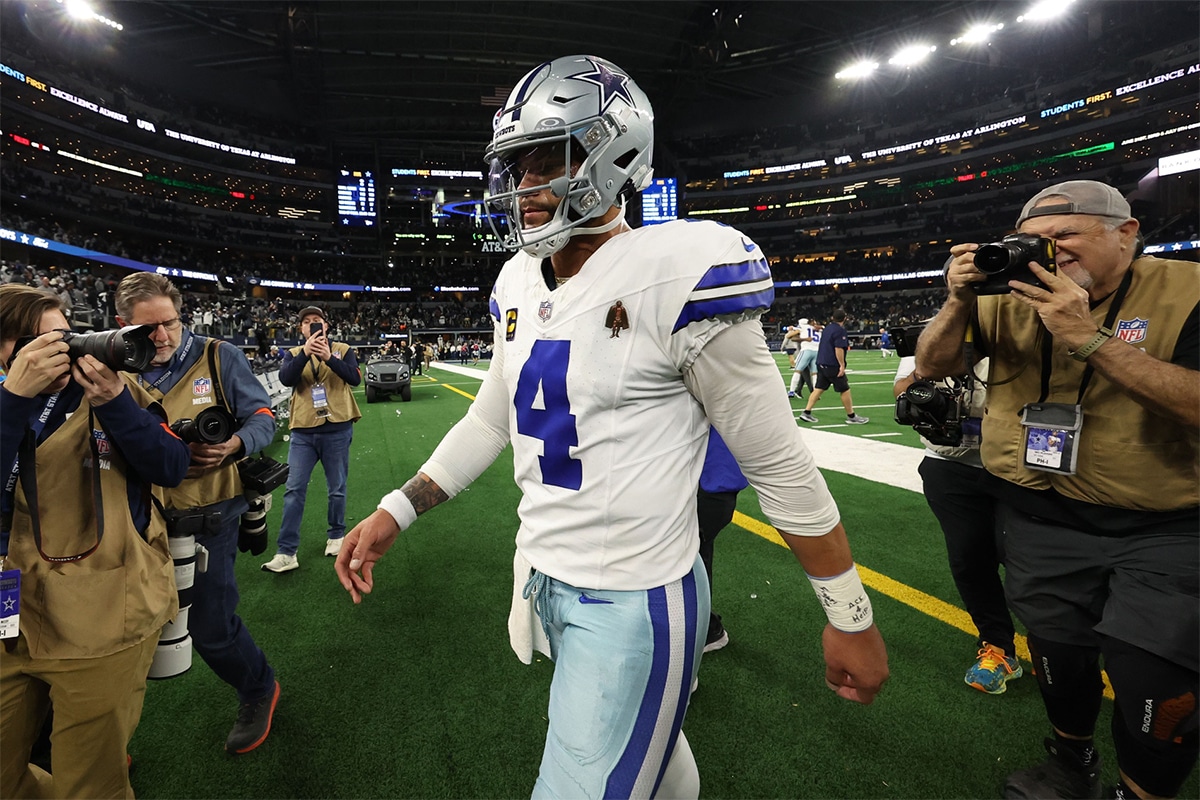 Dallas Cowboys quarterback Dak Prescott (4) walks off the field against the Green Bay Packers after the 2024 NFC wild card game at AT&T Stadium.