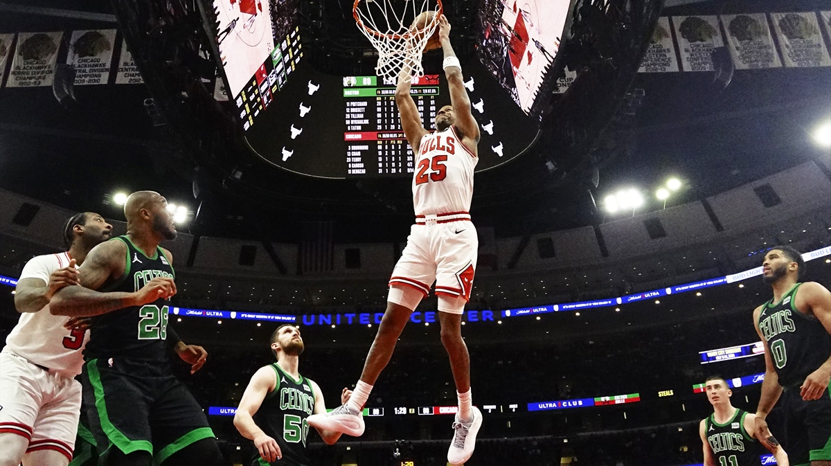 Chicago Bulls forward Dalen Terry (25) goes up for a dunk against the Boston Celtics during the second half at United Center.