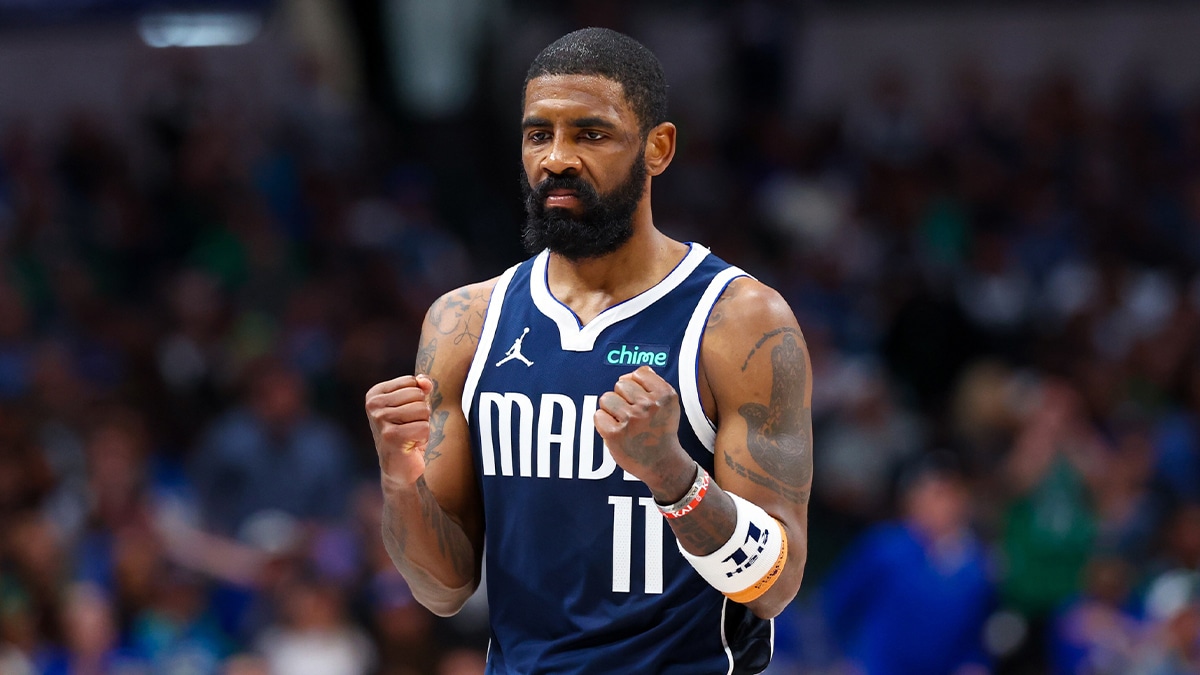 Dallas Mavericks guard Kyrie Irving (11) reacts during the second half against the Denver Nuggets at American Airlines Center. 