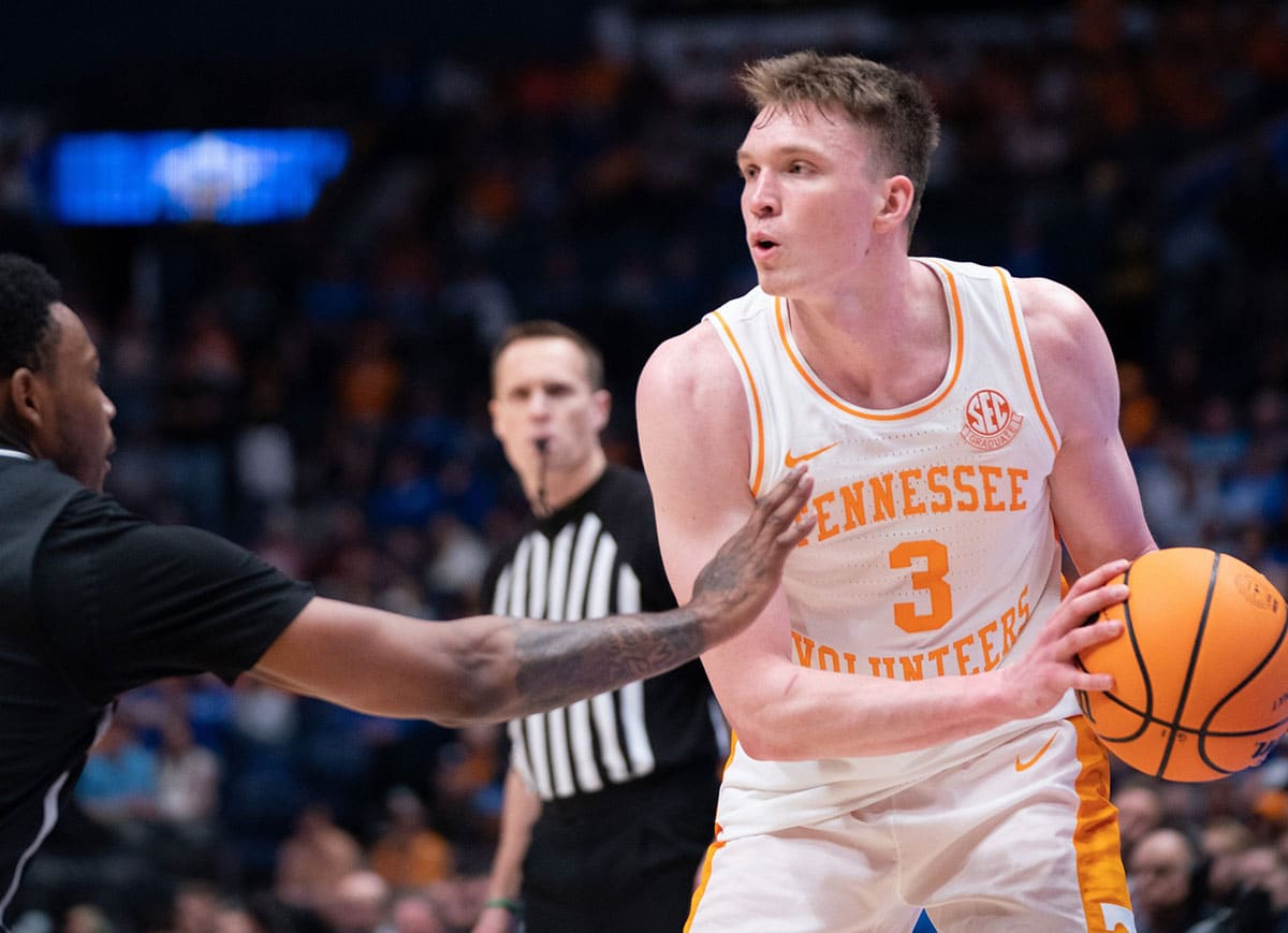 Tennessee Volunteers guard Dalton Knecht (3) looks to pass against Mississippi State during their SEC Men's Basketball Tournament quarterfinal game 