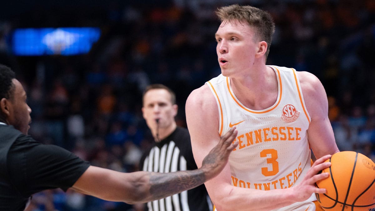 Tennessee Volunteers guard Dalton Knecht (3) looks to pass against Mississippi State during their SEC Men's Basketball Tournament quarterfinal game at Bridgestone Arena in Nashville, Tenn.