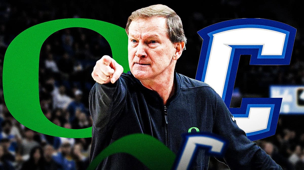 Oregon basketball head coach Dana Altman in front of Oregon and Creighton logos